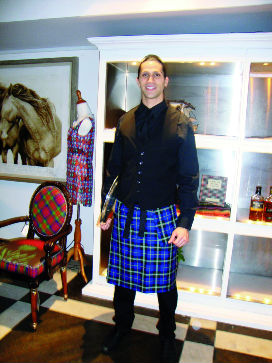Waiter at Get Kilted in New York wearing Italian National Tartan Kilty Apron from the Clan Italia product range