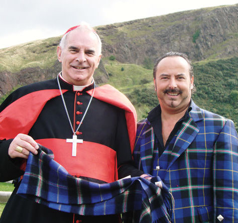 Mike Lemetti of Clan Italia presents Cardinal O'Brien of Glasgow with an Italian National Tatan scarf
