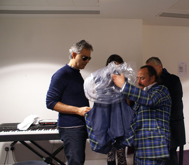 Michael Lemetti presents Andrea Bocelli with Italian National Tartan waiscoat, scarf and bow tie backstage at Glasgow Hydro in Noember 2013
